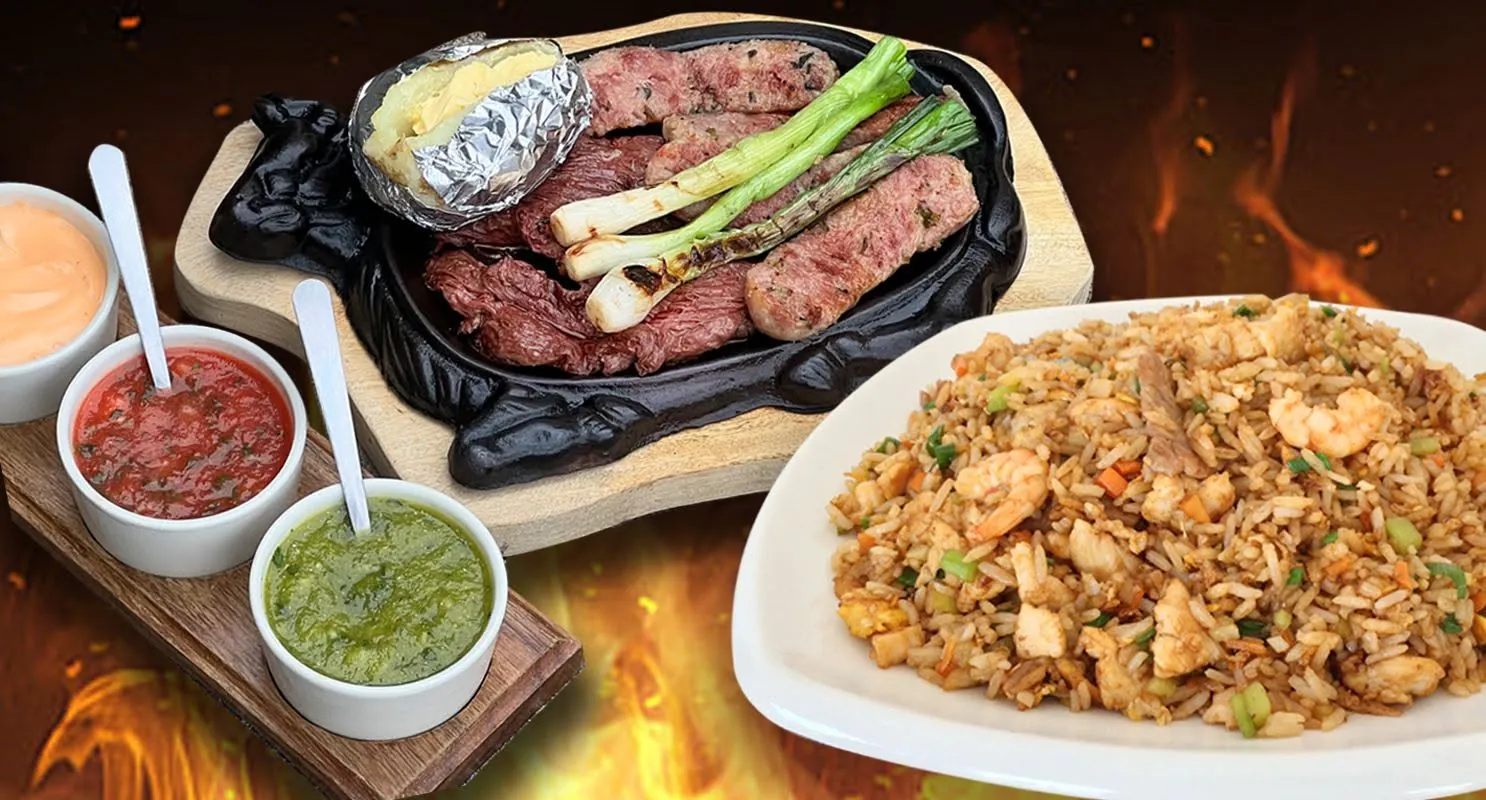 Churrasco en plancha de hierro con papa asada y cebollines, y arroz chino con camarones